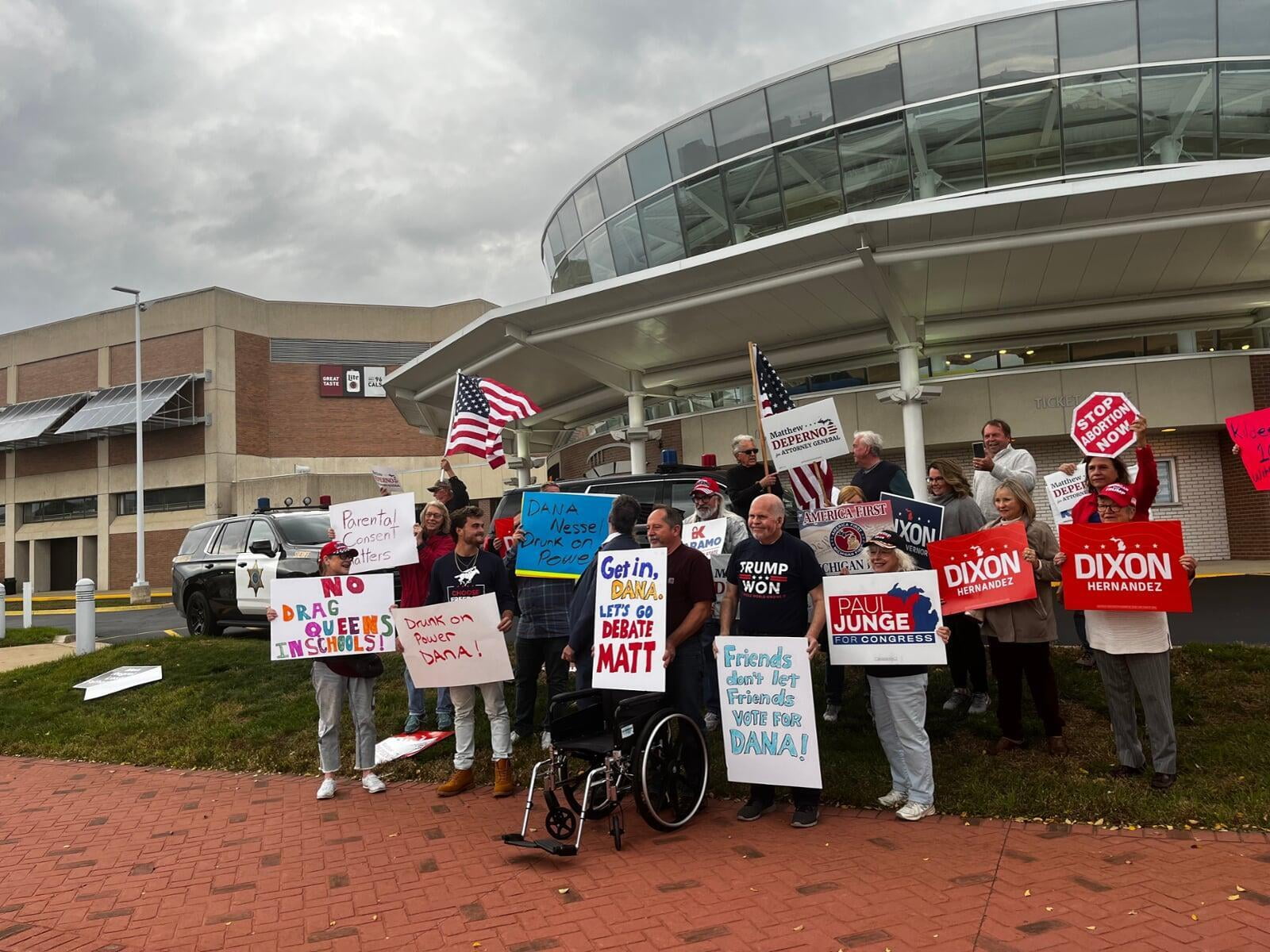 DePerno Tries To Challenge Nessel To Parking Lot Debate, Leaves As Rain Pours